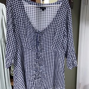 Torrid, Babydoll style top. Front faux corset with gingham pattern.